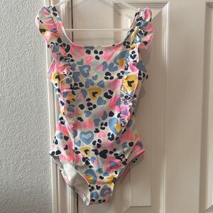 Girls Ruffle One-Piece Swimsuit in Pastel Heart Print